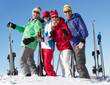 Photo: Group Of Middle Aged Couples On Ski Holiday In Mountains Group Of Middle Aged Couples On Ski Holiday In Mountains