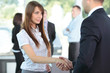 Business people shaking hands, finishing up a meeting