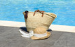 Summer bag on the poolside