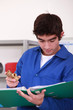Young  person with piece of plumbing