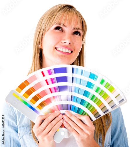 Photo: Woman thinking of redecorating Woman thinking of redecorating