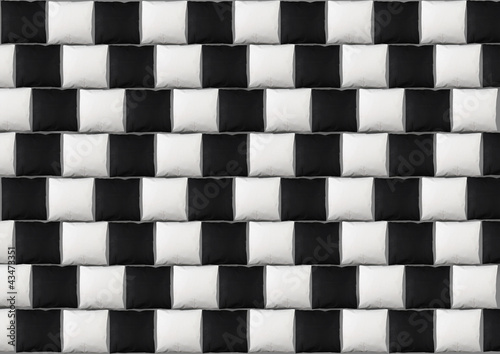 Photo: Optical illusion with black and white pillows Optical illusion with black and white pillows
