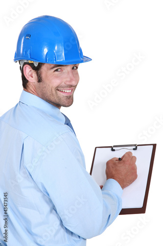Foto: Happy entrepreneur with notepad Happy entrepreneur with notepad