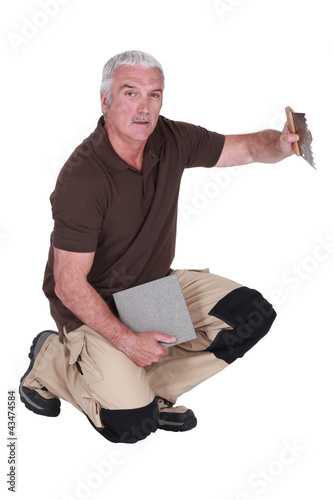 Photo: senior tiler working senior tiler working