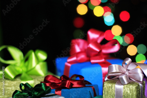Photo: Many gifts in colorful packages Many gifts in colorful packages
