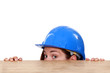 craftswoman hiding behind a table
