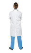 Photo: Back view of a female doctor. Full length shot Back view of a female doctor. Full length shot