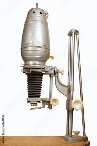 Photo: Antique film duplicator isolated on white Antique film duplicator isolated on white