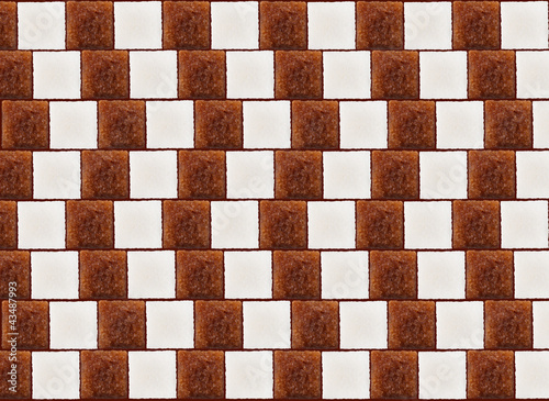 Photo: Optical illusion with lumps of white and cane sugar Optical illusion with lumps of white and cane sugar