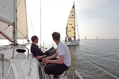 Photo: Sailing on the IJsselmeer in the Netherlands at sunset Sailing on the IJsselmeer in the Netherlands at sunset