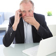 Businessman receiving bad news