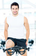 Man cycling at the gym
