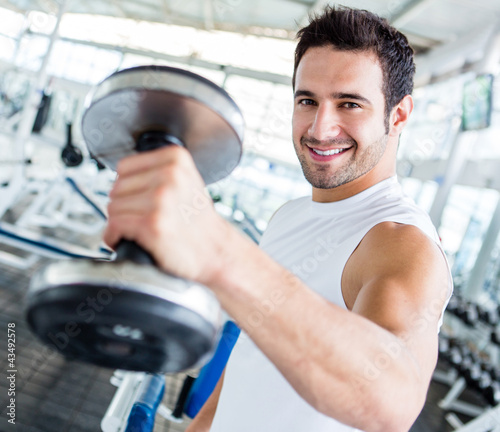 Photo: Strong man at the gym Strong man at the gym
