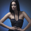 Fashion shoot of a young and sexy brunette Caucasian woman
