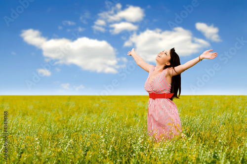 Photo: young women in a field young women in a field