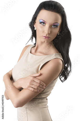Photo: pretty brunette with short dress with crossed arms pretty brunette with short dress with crossed arms