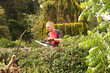 Man checking chainsaw