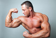 Muscular man flexing his biceps
