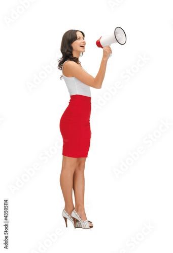 Photo: woman in a dress with megaphone woman in a dress with megaphone
