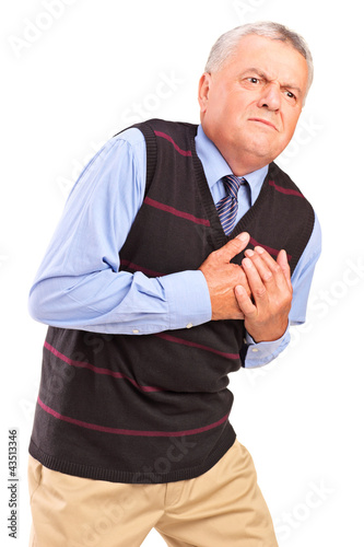 Foto: Mature man having a heart attack Mature man having a heart attack