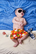 studio photos of newborn child for summer scenery