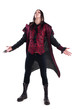 studio portrait of a man dressed as a vampire