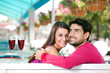 Photo: couple in love in a summer cafe couple in love in a summer cafe