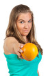 Young woman holding a orange