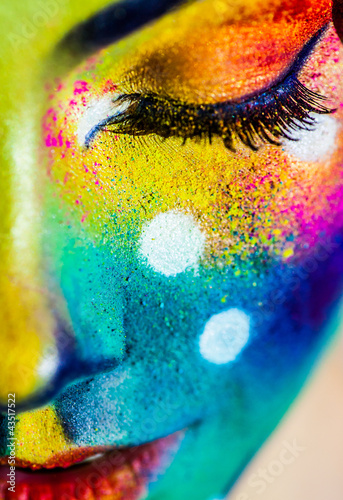 Photo: woman color face art woman color face art
