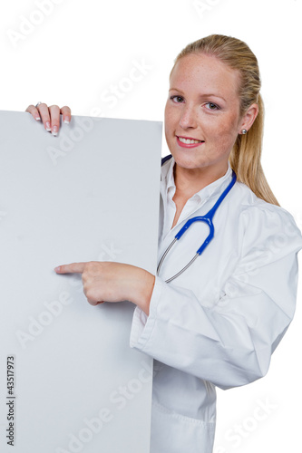 Photo: Ärztin mit Stethoskop und Schild Ärztin mit Stethoskop und Schild