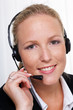freundliche Frau mit Headset im Kundendienst