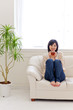a young asian woman relaxing