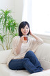 a young asian woman relaxing