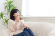 a young asian woman relaxing
