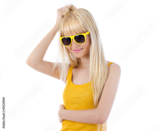 Photo: Smiling woman wearing sunglasses Smiling woman wearing sunglasses