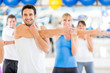 People warming up at the gym