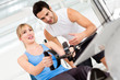Gym woman with trainer
