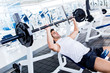 Gym man lifting weights