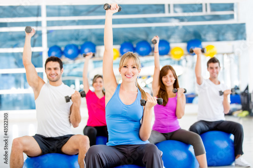 Photo: Gym people working out Gym people working out