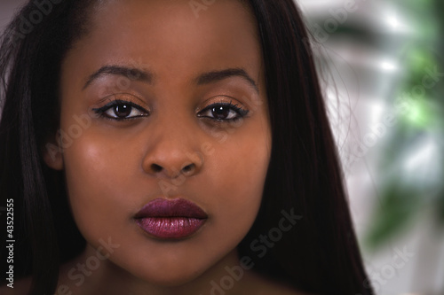 Photo: Ethnic woman beautiful face closeup Ethnic woman beautiful face closeup
