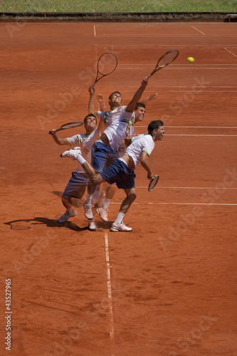 Photo: tennis player at the service (multiple exposure) tennis player at the service (multiple exposure)