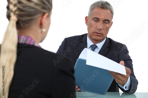 Photo: Businessman interviewing a candidate Businessman interviewing a candidate