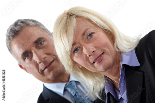 Photo: Mature executive couple Mature executive couple