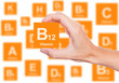 Hand holds a box of vitamin B12