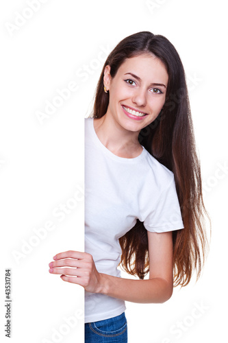 Foto: woman standing near empty board woman standing near empty board