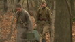 The soldiers dragged the machine gun