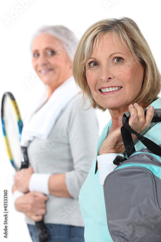 Photo: Mother and daughter going to the gym together Mother and daughter going to the gym together