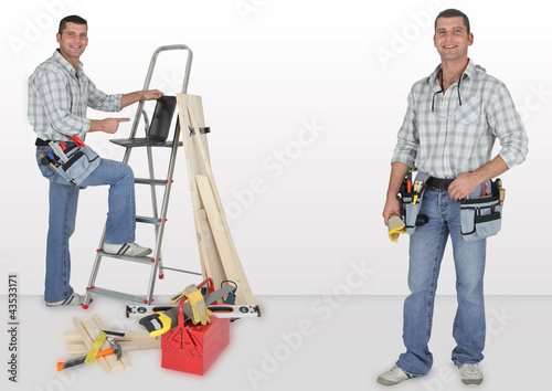 Photo: duo of twin carpenters at work duo of twin carpenters at work