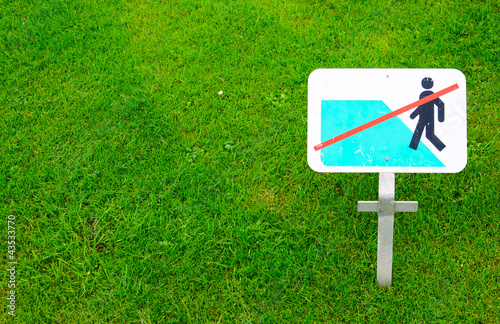 Photo: No walking on grass warning sign No walking on grass warning sign