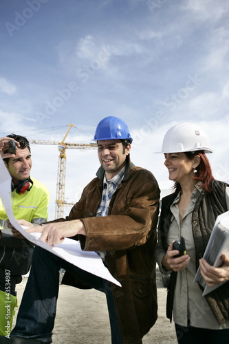 Photo: Teamwork on a building site Teamwork on a building site